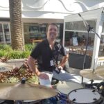 Steve Powell sitting behind a drum kit