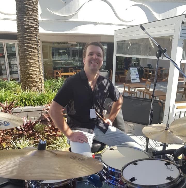 Steve Powell sitting behind a drum kit