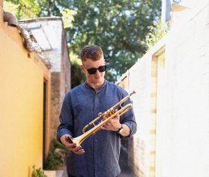lachlan mckenzie holding a trumpet