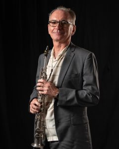 graeme norris holding saxophone