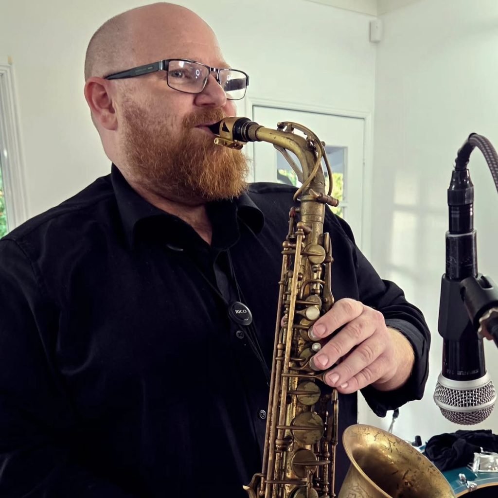 Brad McCarthy playing saxophone